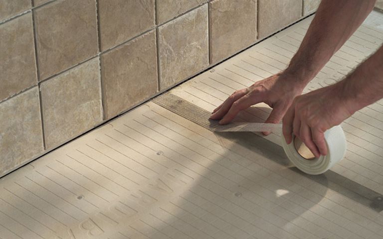 How to use a laser level to install tiles